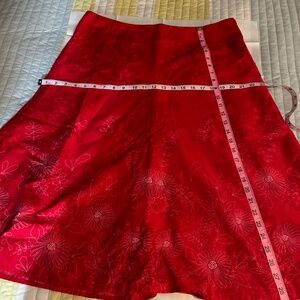 Sassy red skirt with white print at hem